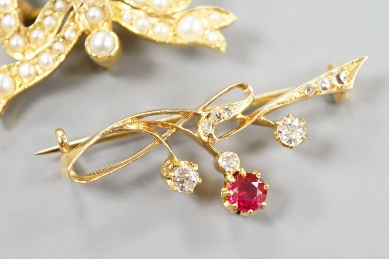 A yellow metal, ruby? and diamond set brooch, 36mm and a modern 9ct gold and split pearl set ribbon bow brooch, gross 8.5 grams.